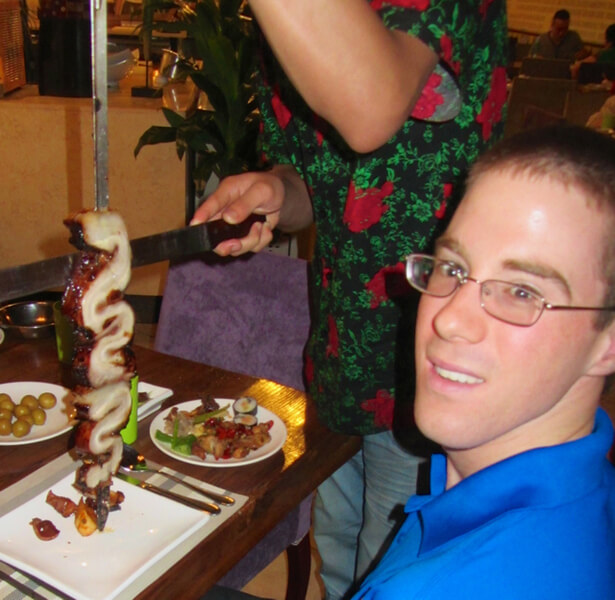 Image Colin of SilverFire enjoying his favorite Hunan specialty!